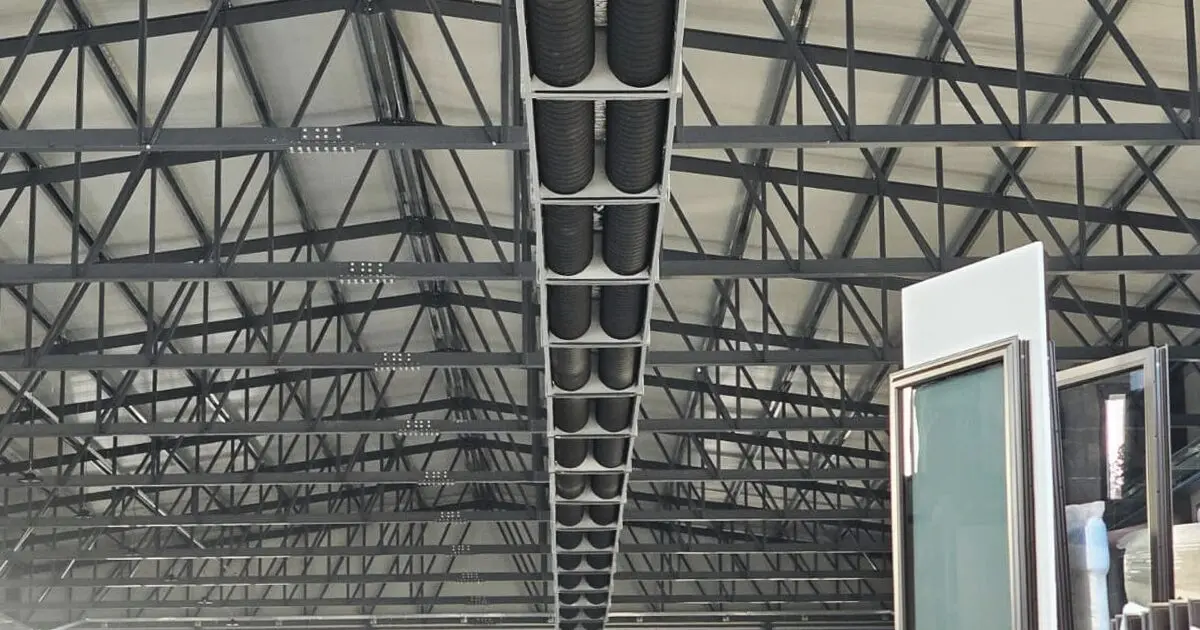 Radiant diffusers, tubes, and strips, warehouse with pipes