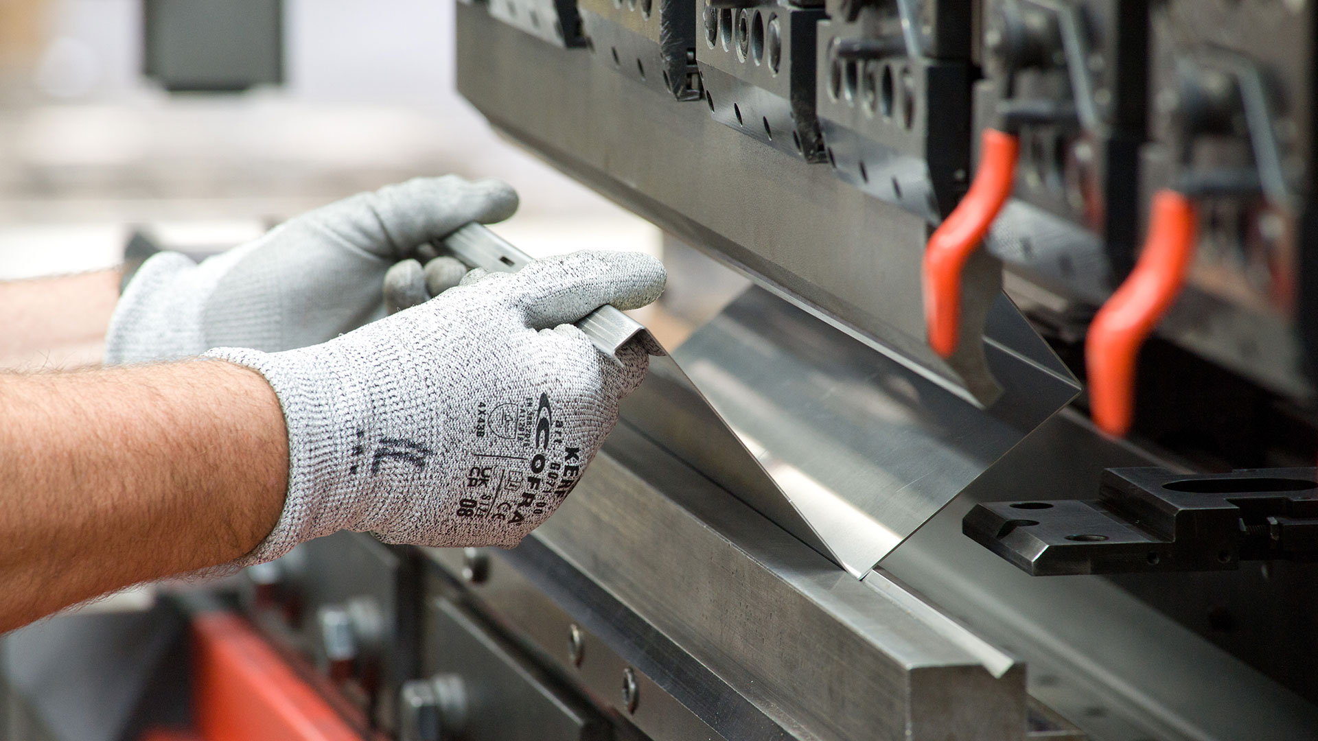 Press brake in operation machinery used to create precise and reliable repeatable bends on sheet metal